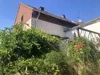 Gartenansicht 2 - Renovierungsbedürftige Doppelhaushälfte mit Garten und Doppelgarage