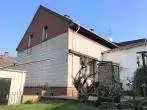 Titelbild - Renovierungsbedürftige Doppelhaushälfte mit Garten und Doppelgarage