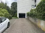 TGaragenzufahrt - Sehr gepflegte Eigentumswohnung mit Loggia inklusive Gartengrundstück in zentraler Lage von Gevelsberg