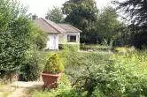 Außen- und Gartenansicht - Renovierungsbedürftiger Bungalow auf großem Grundstück in Sprockhövel