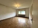 Wohnzimmer EG linkes Haus - Sanierungsbedürftige Doppelhaushälfte in Dortmund-Brackel